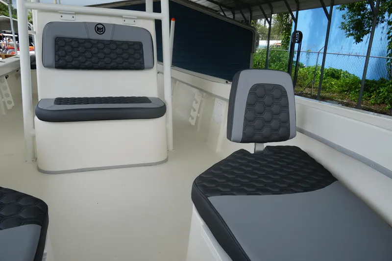 Slide: The Image of 2026 May-Craft 238 Center Console boat interior with stylish seating and modern design. - 30