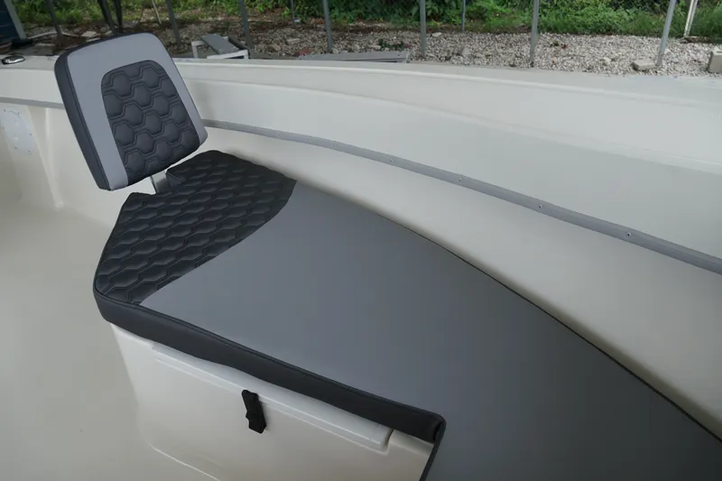 Slide: The Image of 2026 May-Craft 238 Center Console boat seat with gray and black upholstery. - 31