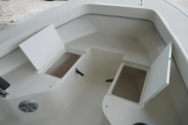 Slide: The Image of 2026 May-Craft 238 Center Console boat interior with open storage compartments. - 34