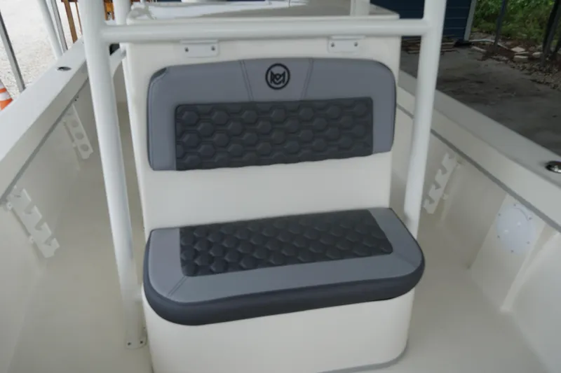 Slide: The Image of 2026 May-Craft 238 Center Console boat seat with gray cushioned backrest. - 37