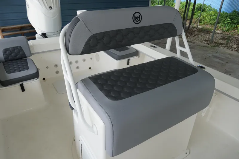 Slide: The Image of 2026 May-Craft 238 Center Console boat seat with gray and black cushioning. - 40