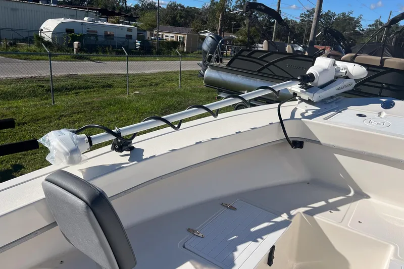 Slide: The Image of 2026 May-Craft 238 Center Console boat with Garmin trolling motor on deck. - 47