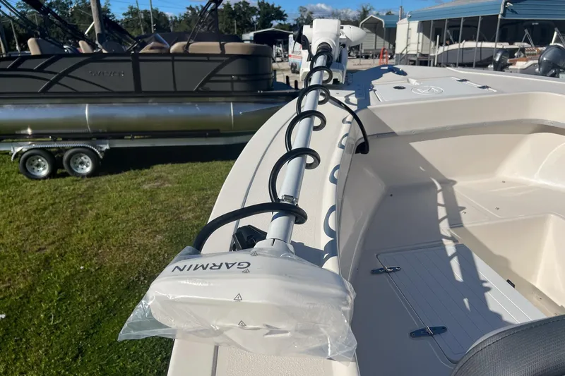 Slide: The Image of 2026 May-Craft 238 Center Console boat with Garmin equipment on deck. - 48