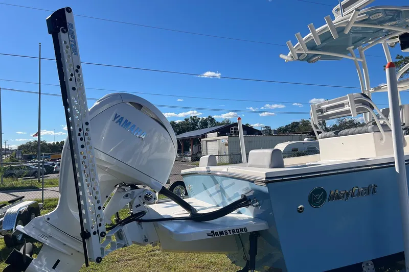 Slide: The Image of 2026 May-Craft 238 Center Console boat with Yamaha engine, outdoor display. - 5