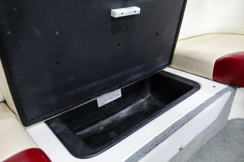 Slide: The Image of Open storage compartment in 2002 MasterCraft X-10 boat interior. - 26