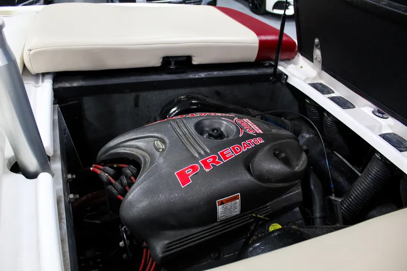 Slide: The Image of 2002 MasterCraft X-10 engine compartment featuring a Predator engine. - 38