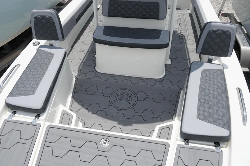 Slide: The Image of 2026 May-Craft 220 Bay boat interior with gray hexagonal-patterned seating and flooring. - 33
