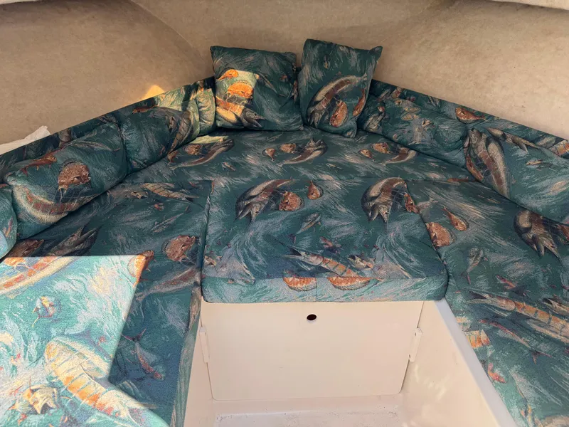 Slide: The Image of 2011 Clearwater 21 WAC cabin interior with fish-patterned cushions. - 5