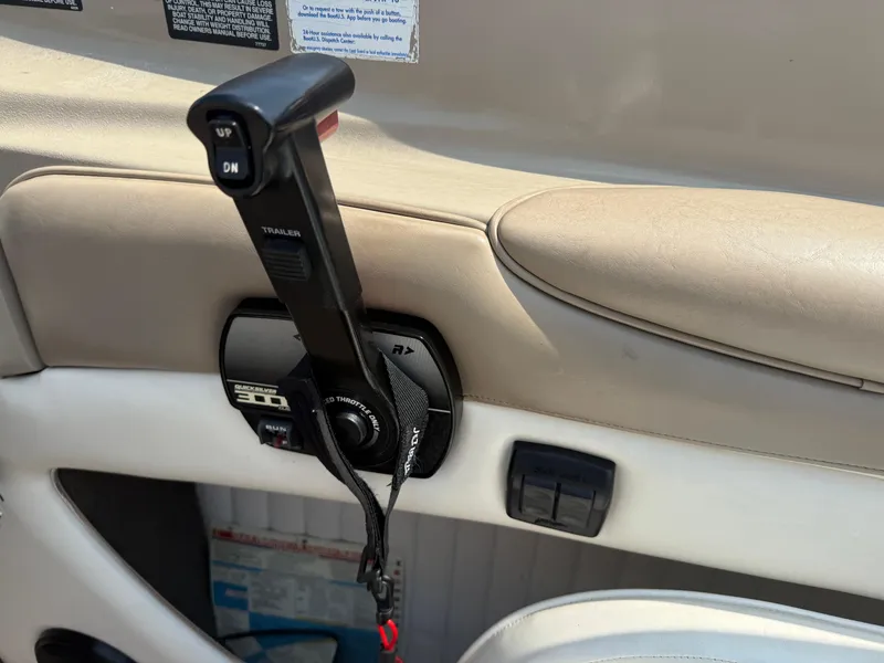 Slide: The Image of Throttle control lever on a 1999 Bayliner 2350 Capri SS boat dashboard. - 7