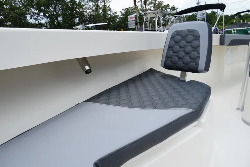 Slide: The Image of 2026 May-Craft 245 Offshore CC boat seat with hexagonal pattern upholstery. - 18