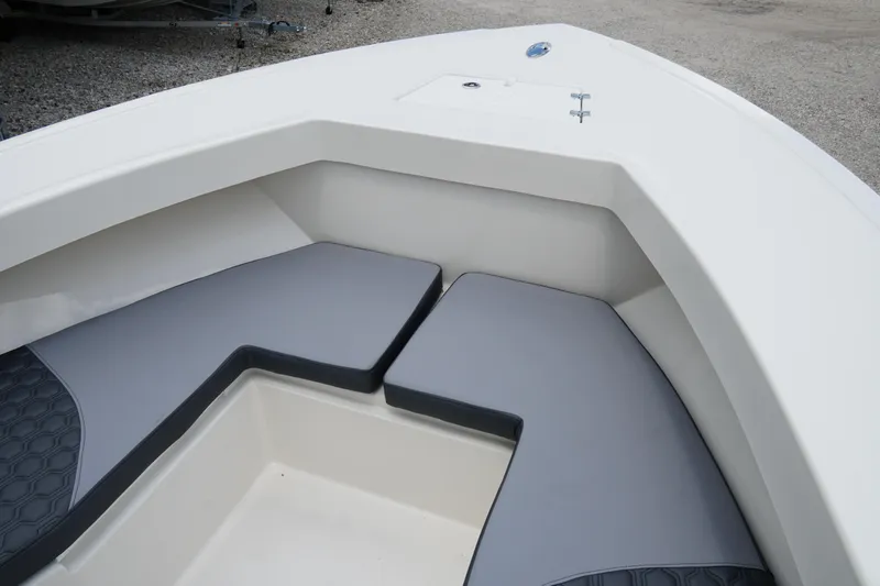 Slide: The Image of 2026 May-Craft 245 Offshore CC boat interior with cushioned seating. - 22