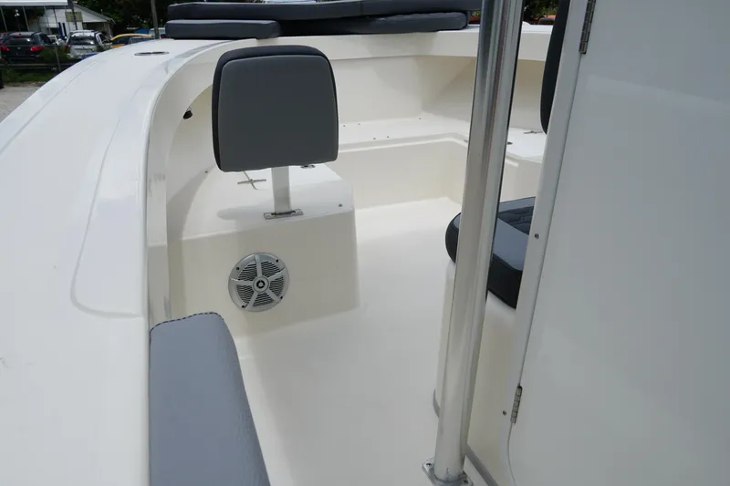 Slide: The Image of 2026 May-Craft 245 Offshore CC boat interior with seating and speaker. - 26