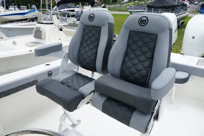 Slide: The Image of Luxury seating on 2026 May-Craft 245 Offshore CC boat, featuring sleek design and comfort. - 33