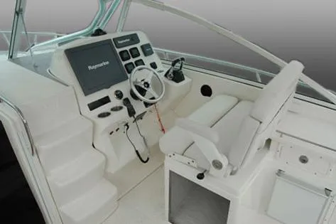 Slide: The Image of Manufacturer Provided Image: 2014 Wellcraft 340 Coastal boat helm with modern navigation system - 10