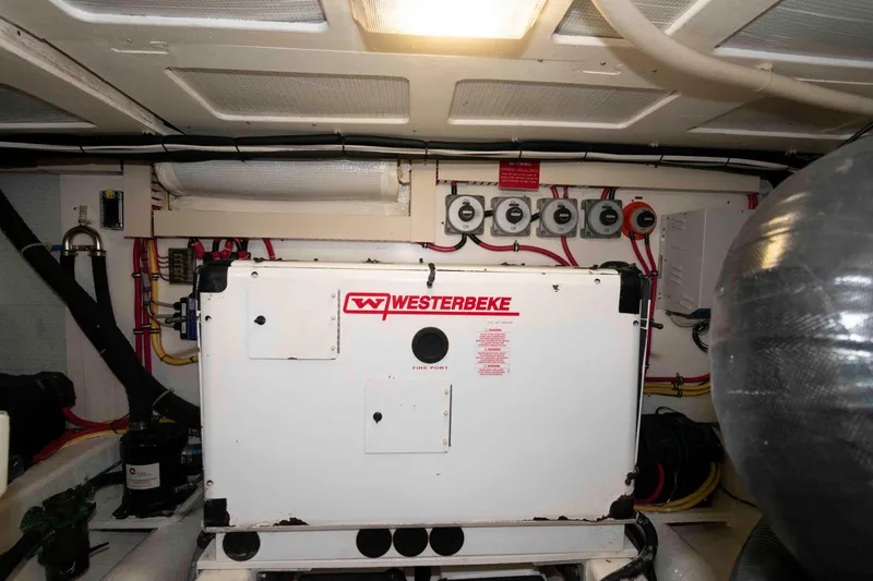 Slide: The Image of Engine room of 2003 Sabre 42 Express with Westerbeke generator. - 32