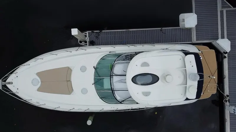 Slide: The Image of Aerial view of a 2005 Cruisers Yachts 500 Express docked at a marina. - 11