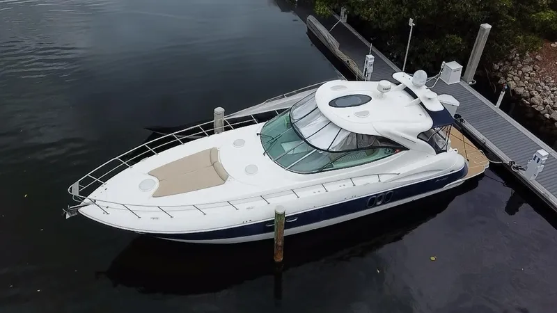 The Image of 2005 Cruisers Yachts 500 Express docked at marina, aerial view. - 0