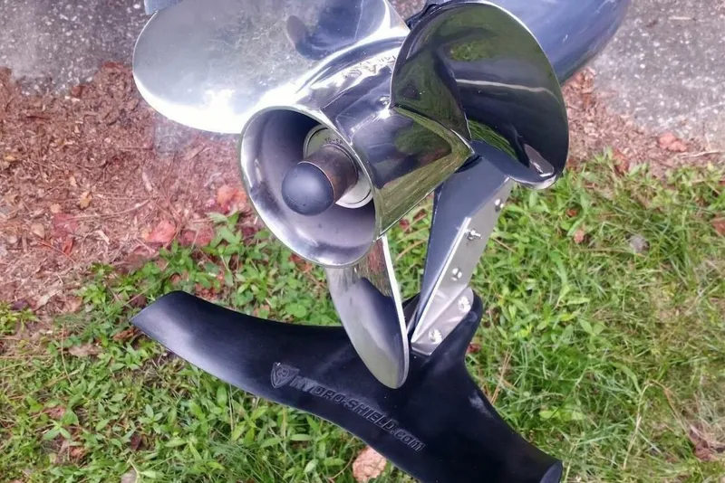 Slide: The Image of Close-up of a 2005 Rosborough RF-246 Sedan Cruiser propeller on grass. - 21