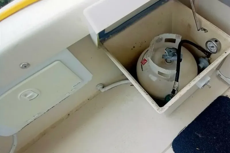 Slide: The Image of Propane tank storage on 2005 Rosborough RF-246 Sedan Cruiser boat. - 27