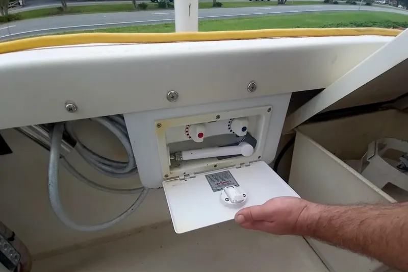 Slide: The Image of Control panel of a 2005 Rosborough RF-246 Sedan Cruiser with open compartment. - 28