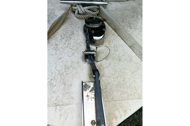 Slide: The Image of Anchor winch on 2005 Rosborough RF-246 Sedan Cruiser deck, with ropes and chains. - 34