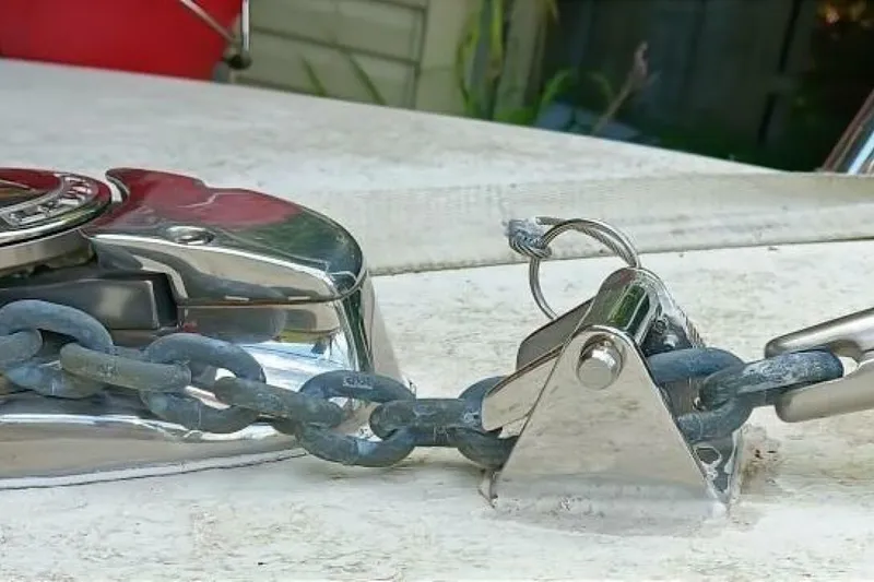 Slide: The Image of Anchor chain mechanism on 2005 Rosborough RF-246 Sedan Cruiser boat deck. - 35