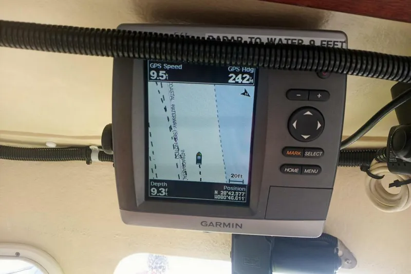 Slide: The Image of Garmin GPS display on 2005 Rosborough RF-246 Sedan Cruiser showing speed, heading, and depth. - 40