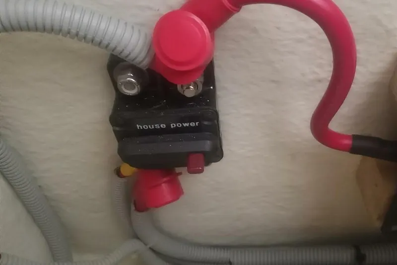 Slide: The Image of Electrical connection labeled "house power" in a 2005 Rosborough RF-246 Sedan Cruiser. - 48