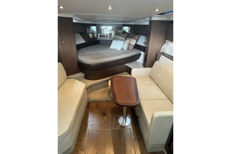Slide: The Image of Interior of 2016 Sea Ray 350 Sundancer yacht with seating and bed. - 111