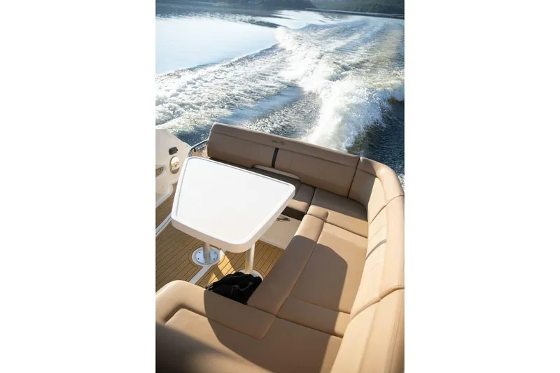 Slide: The Image of 2016 Sea Ray 350 Sundancer yacht cruising on calm waters. - 33