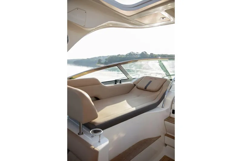 Slide: The Image of Built-in grill on 2016 Sea Ray 350 Sundancer boat, featuring Kenyon cooking appliance. - 56