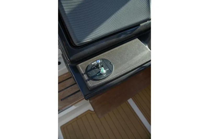 Slide: The Image of 2016 Sea Ray 350 Sundancer interior with speaker and window view. - 74