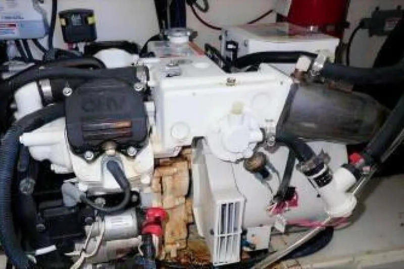 Slide: The Image of Engine compartment of a 2016 Sea Ray 350 Sundancer with Kohler power systems. - 81