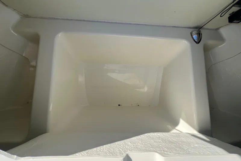 Slide: The Image of 2015 Zodiac N-ZO 760 boat storage compartment, empty and clean. - 24