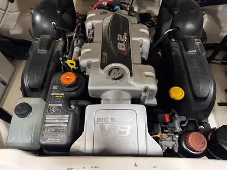 Slide: The Image of 2015 Sea Ray 250 SLX engine, featuring a powerful 8.2L V8 configuration. - 14