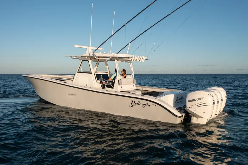 Slide: The Image of 2019 Yellowfin 39 boat with Mercury engines on open water. - 1