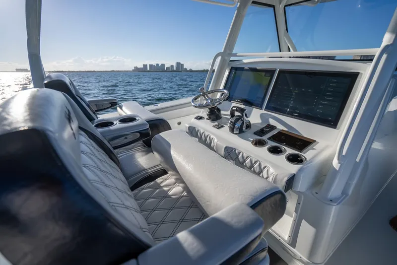 Slide: The Image of 2019 Yellowfin 39 boat cockpit with modern controls and ocean view. - 24