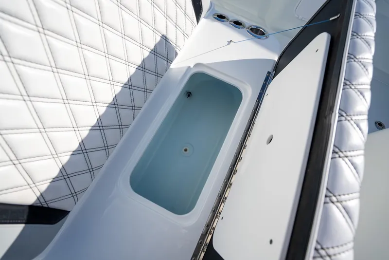 Slide: The Image of 2019 Yellowfin 39 boat interior storage compartment with quilted upholstery. - 37
