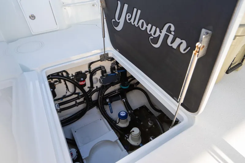 Slide: The Image of 2019 Yellowfin 39 boat storage compartment with open hatch. - 43
