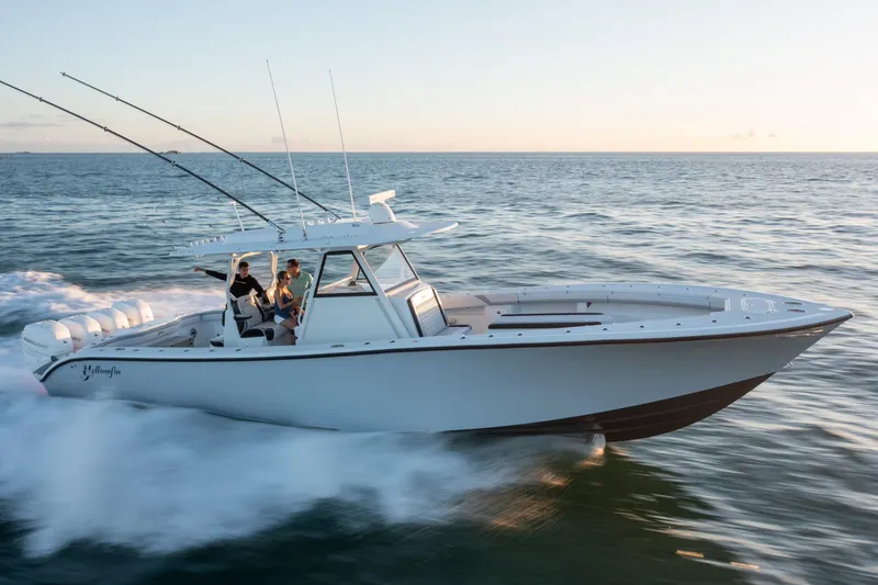 Slide: The Image of 2019 Yellowfin 39 boat speeding on the ocean at sunset. - 8