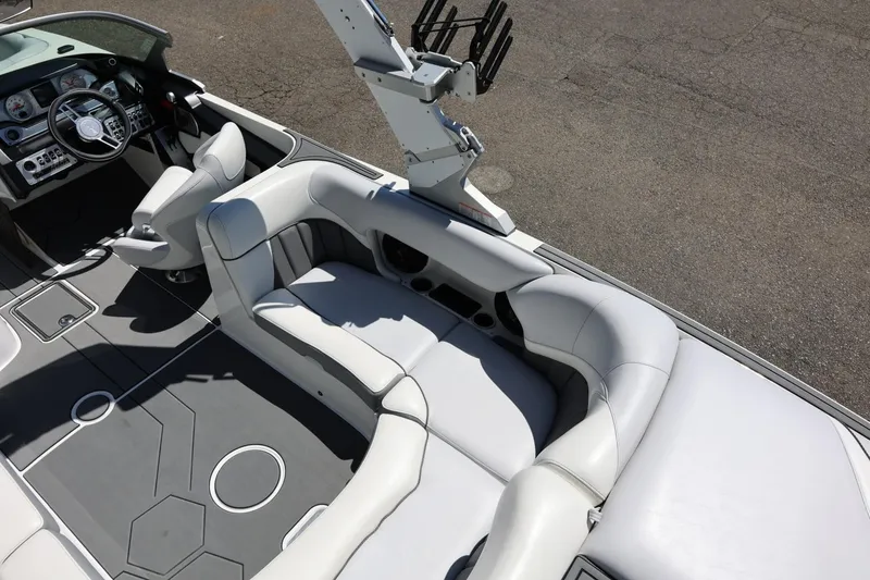 Slide: The Image of Luxurious interior of 2018 MB B52 23 boat with sleek seating and modern dashboard. - 17