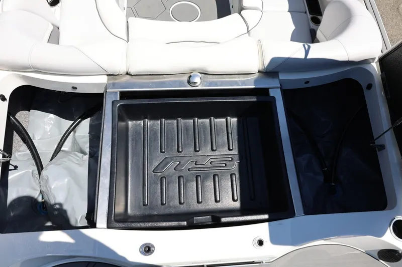 Slide: The Image of Interior view of a 2018 MB B52 23 boat with storage compartment. - 19