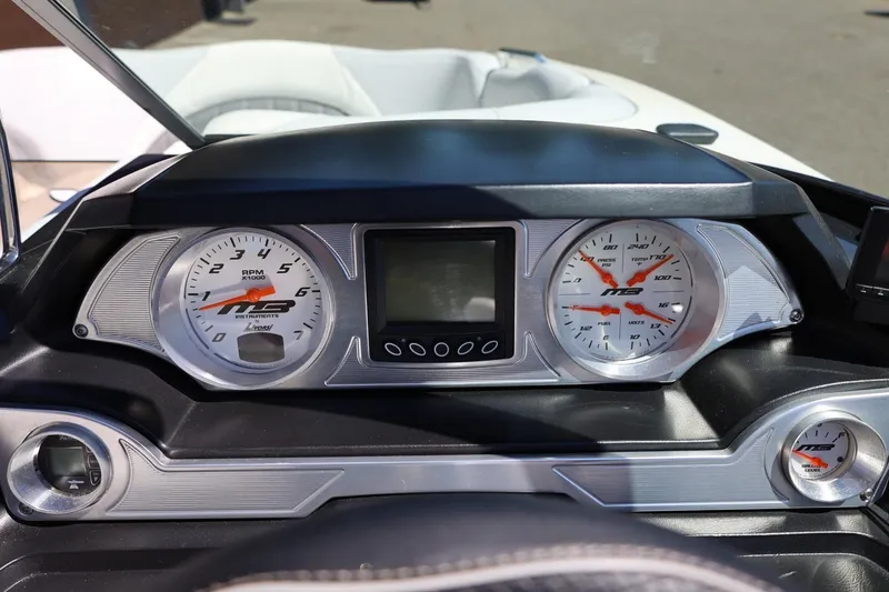 Slide: The Image of Dashboard of 2018 MB B52 23 boat with gauges and digital display. - 31