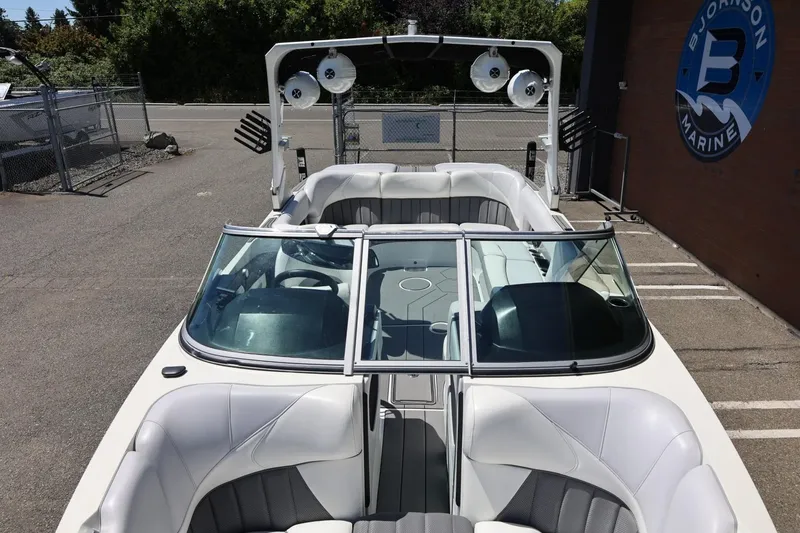 Slide: The Image of 2018 MB B52 23 boat with sleek interior, parked at Bjornson Marine. - 35