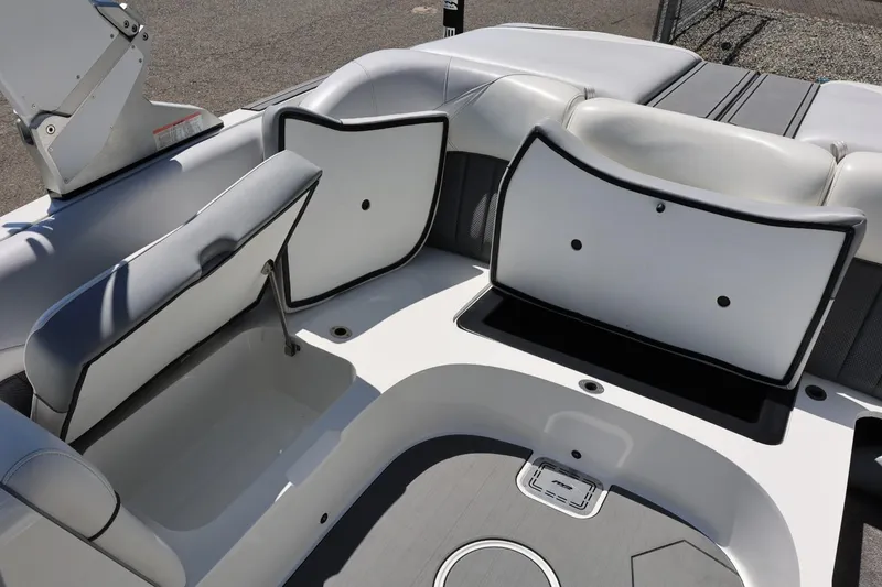 Slide: The Image of Interior of 2018 MB B52 23 boat with open storage compartments and seating. - 41