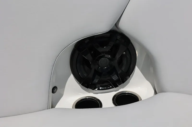 Slide: The Image of Speaker and cup holders in 2018 MB B52 23 boat interior. - 43