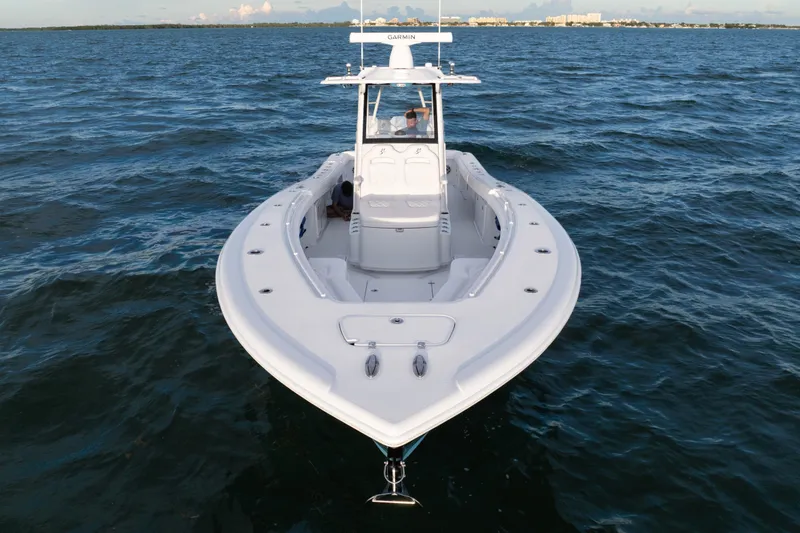 Slide: The Image of 2026 Yellowfin 36 Offshore boat cruising on open water, showcasing sleek design and advanced features. - 10