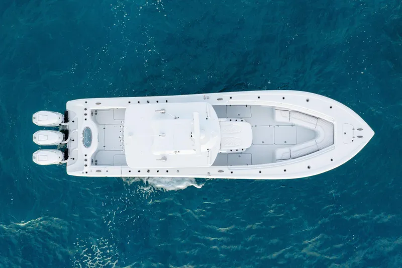 Slide: The Image of Aerial view of 2026 Yellowfin 36 Offshore boat on blue ocean water. - 11