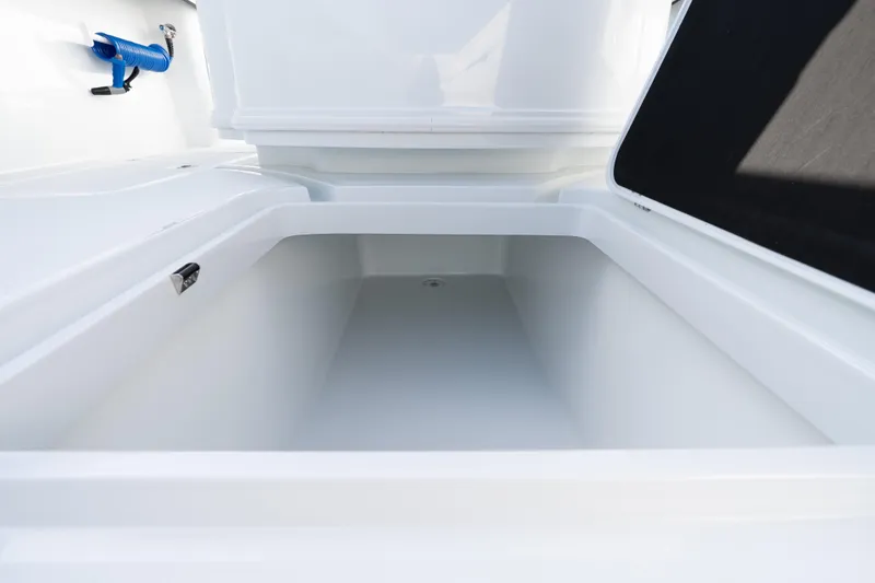 Slide: The Image of Open storage compartment on 2026 Yellowfin 36 Offshore boat, showcasing spacious interior. - 20