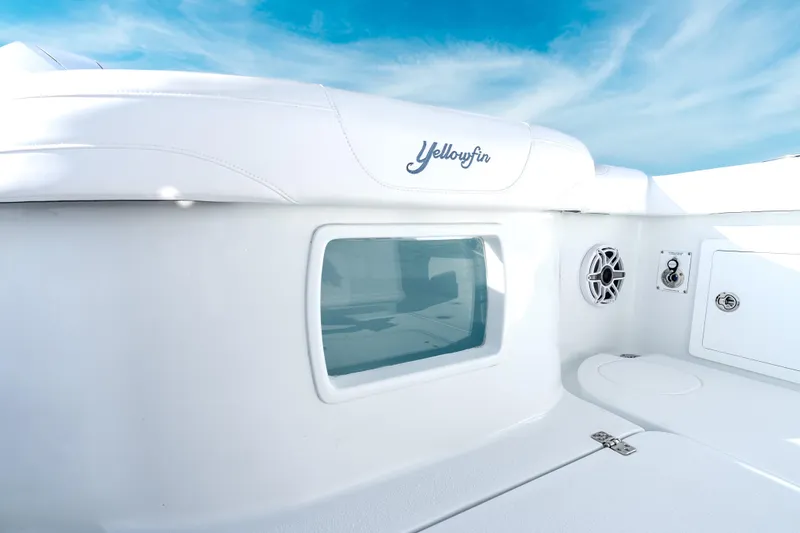 Slide: The Image of 2026 Yellowfin 36 Offshore boat interior with sleek white design and modern features. - 26